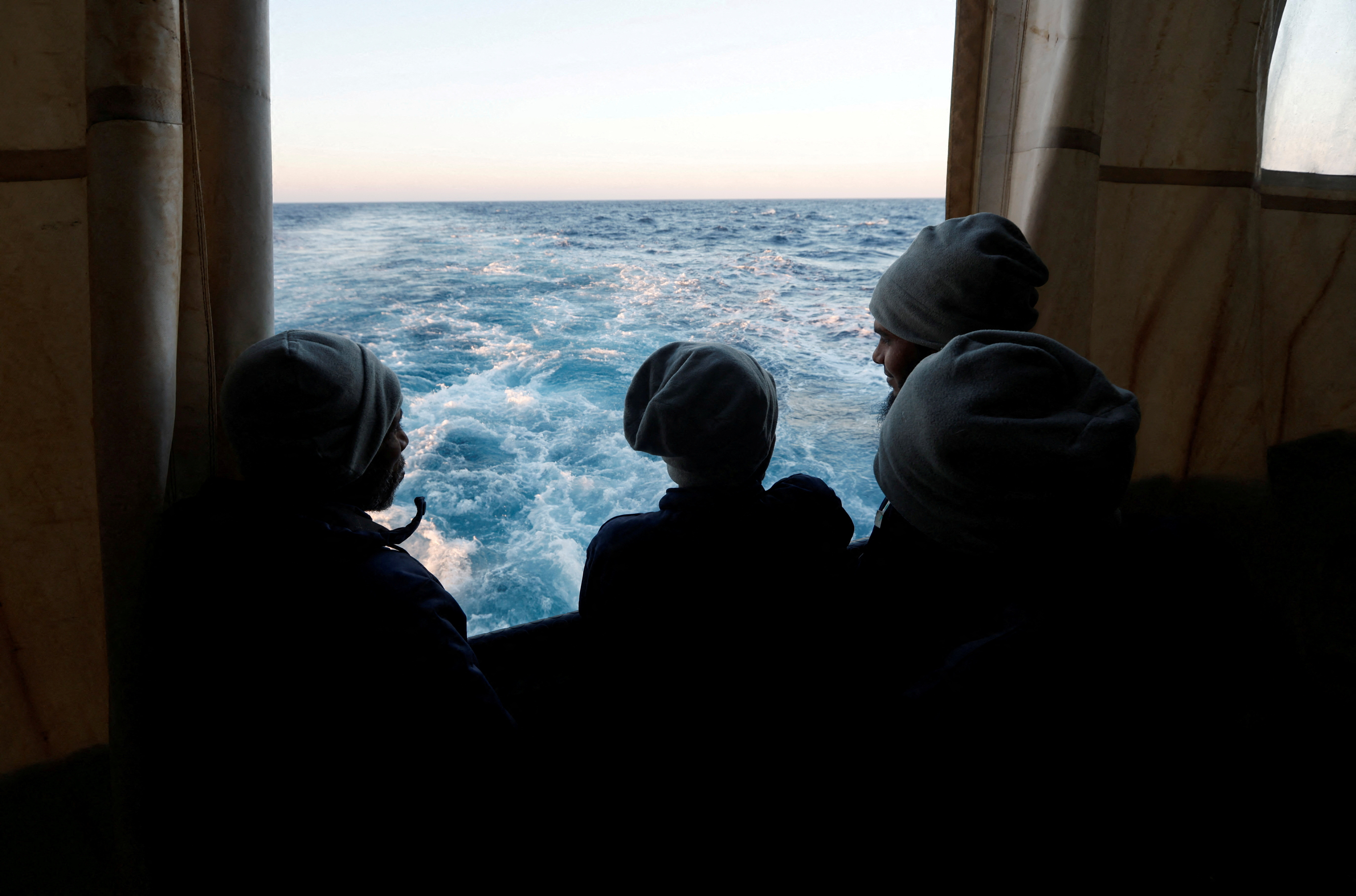 FILE PHOTO: Rescued migrants on MSF rescue ship Geo Barents in the Mediterranean