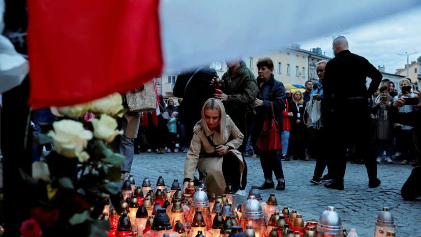 Mourners gather to hold a vigil for the Polish aid worker Damian Sobol who was killed by the Israeli army in Gaza, in Przemysl