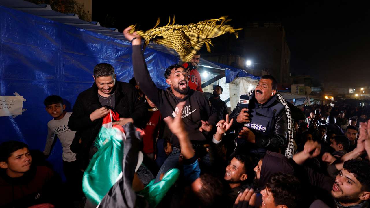 Palestinians react to news on a ceasefire deal with Israel, in Khan Younis in the southern Gaza Strip