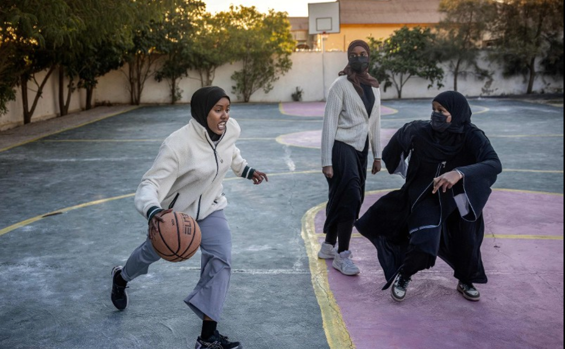 Female basketball players practice during a training session with their women-only football team at Ubah Inspire and Fitness Center in Hargeisa