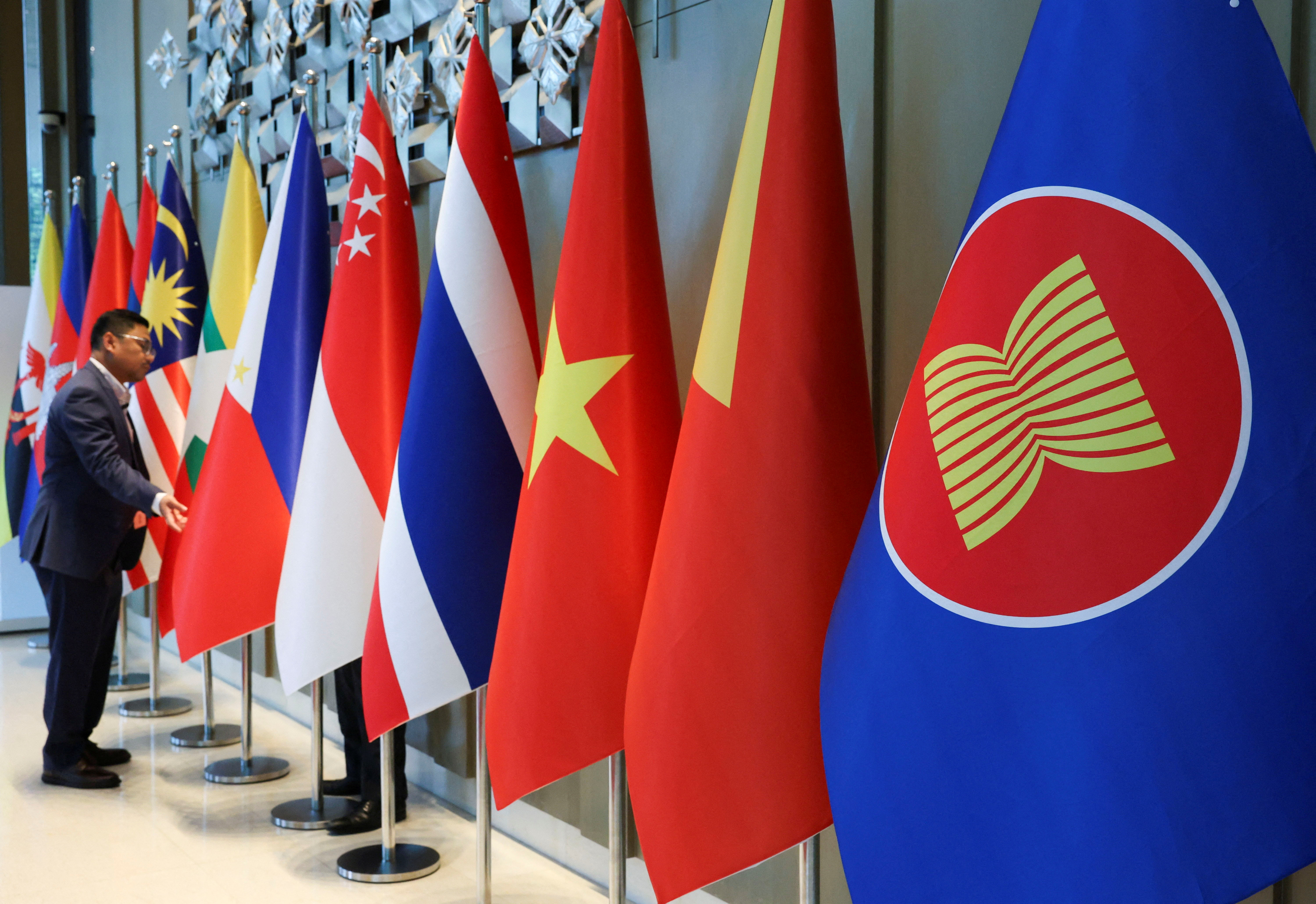 The ASEAN flag is placed alongside the flags of its member countries ahead of the ASEAN Foreign Ministers' Retreat in Langkawi