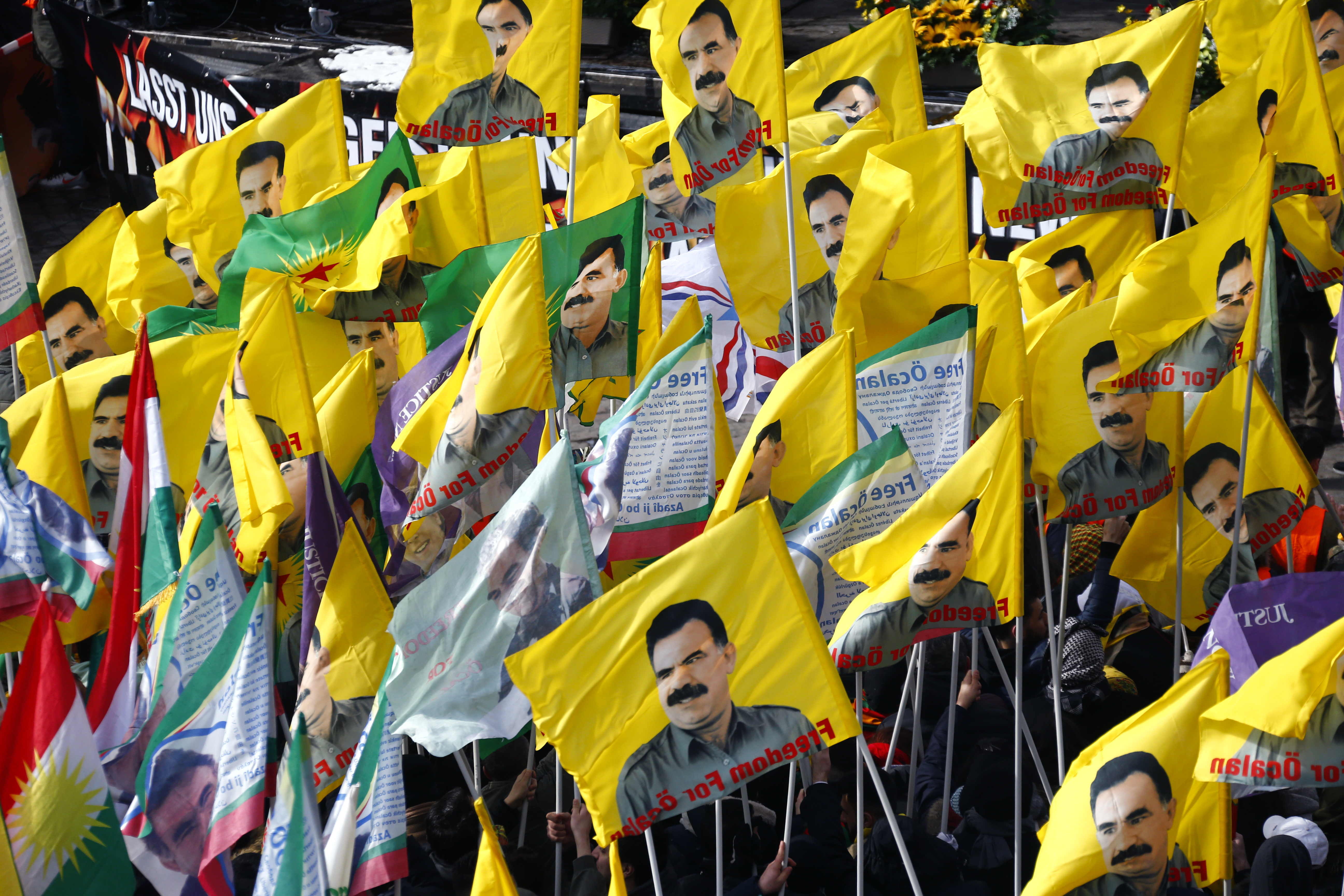 People attend a demonstration organised by Kurds in Hanover