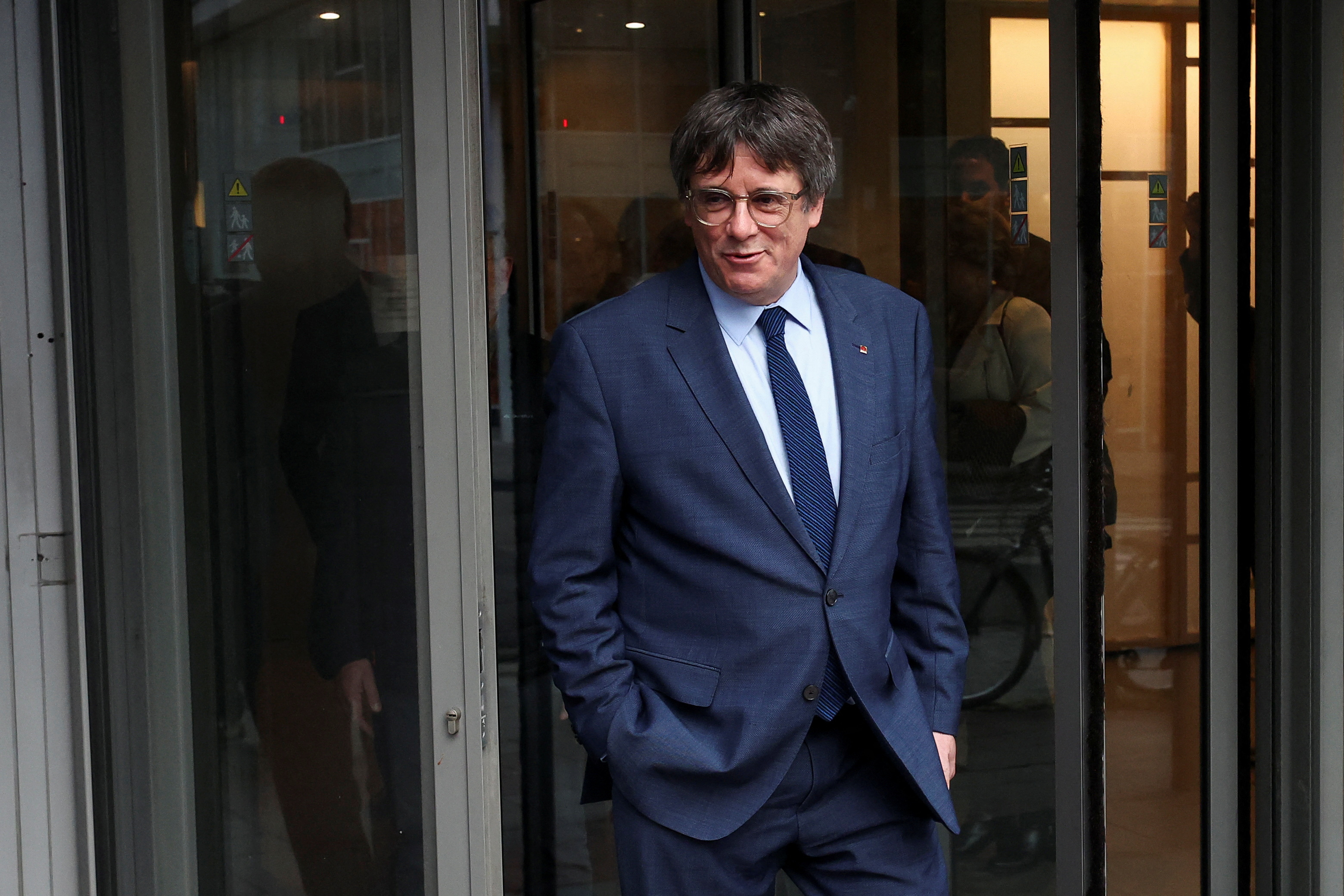 Spain's Socialist and Junts expected to confirm a deal to form government, in Brussels