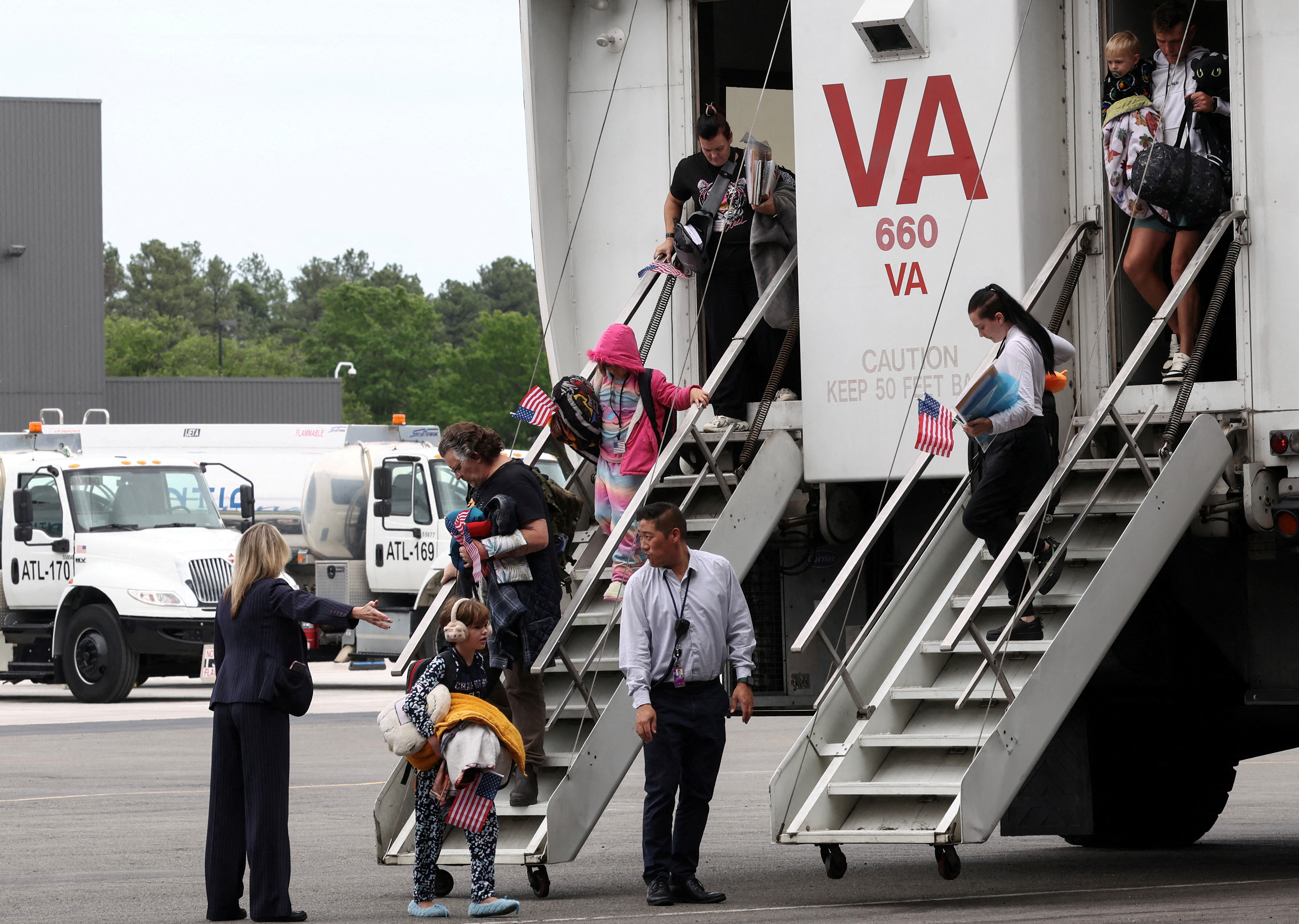 White South African refugees arrive at Dulles Airport in Virginia