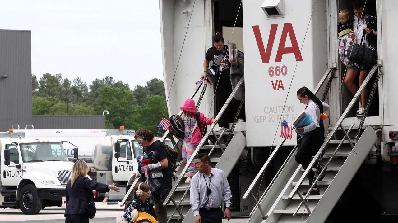 White South African refugees arrive at Dulles Airport in Virginia