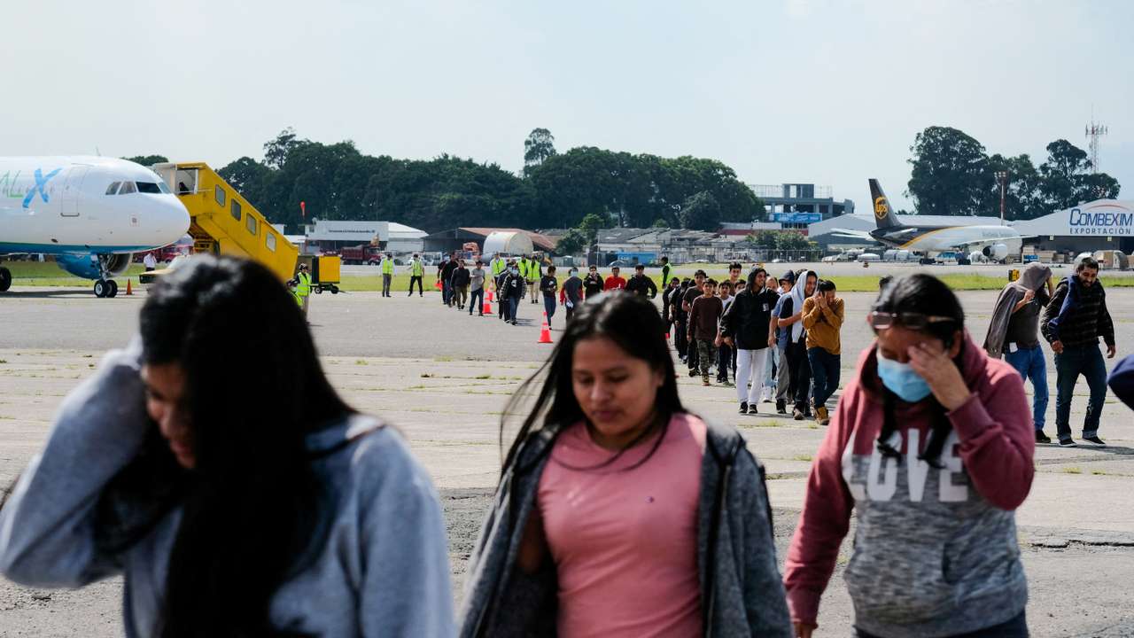 FILE PHOTO: Guatemalan migrants arrive on a deportation flight from the U.S., in Guatemala City