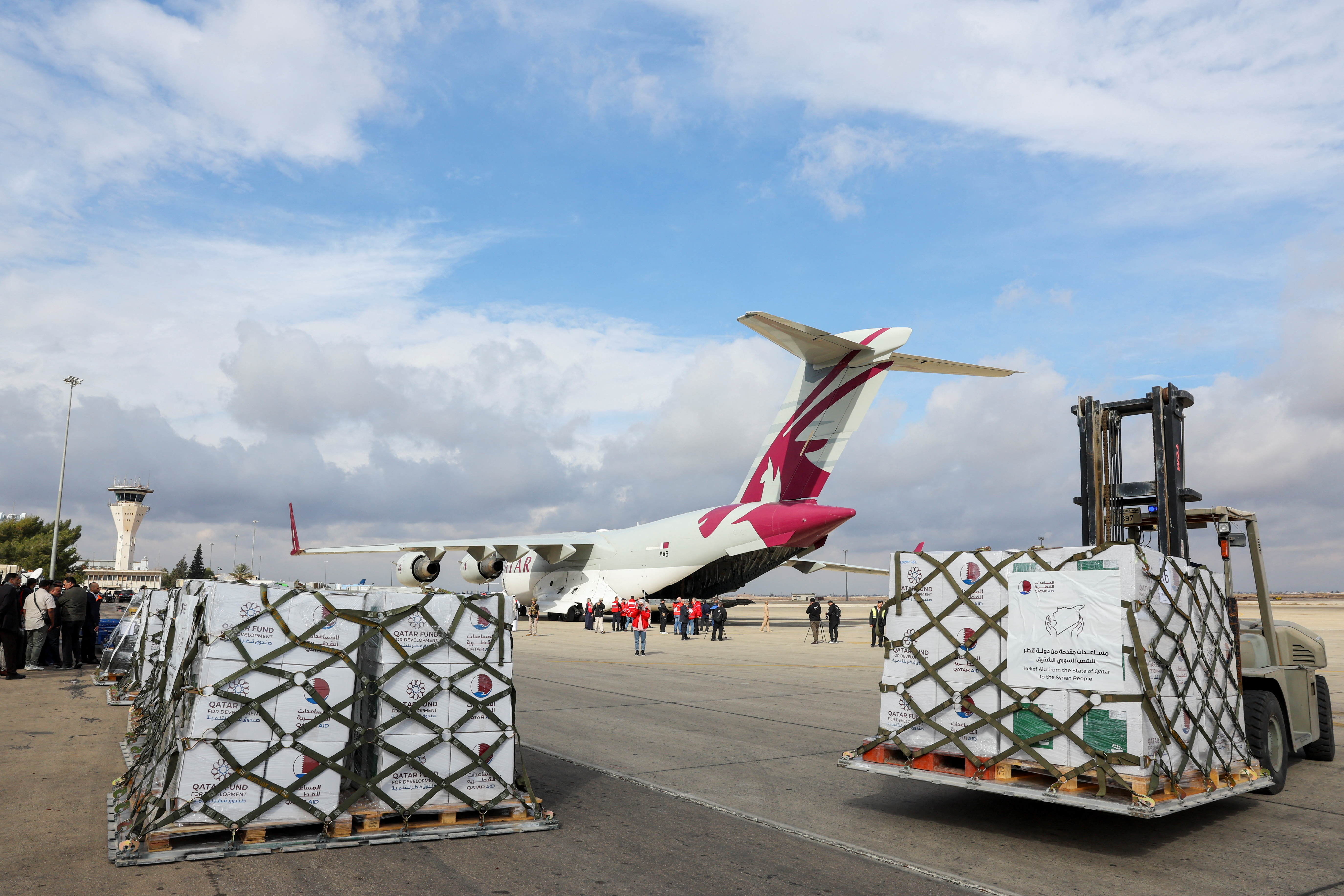A plane carrying aid from Qatar arrives at Damascus International Airport