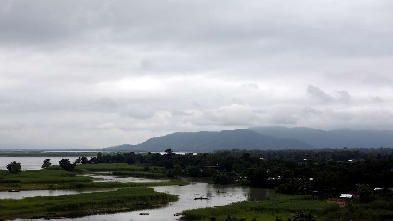 FILE PHOTO: Boats are seen in the Brahmaputra river in Jogighopa