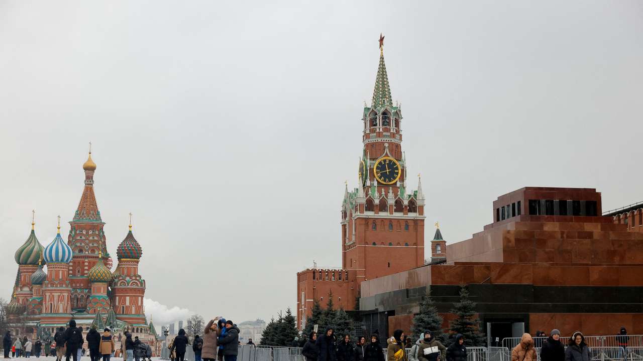 FILE PHOTO: People walk in Red Square in central Moscow