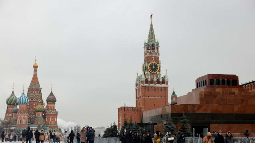 FILE PHOTO: People walk in Red Square in central Moscow