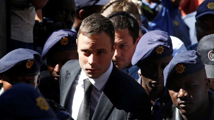 FILE PHOTO: South African Olympic and Paralympic sprinter Pistorius arrives at the North Gauteng High Court in Pretoria