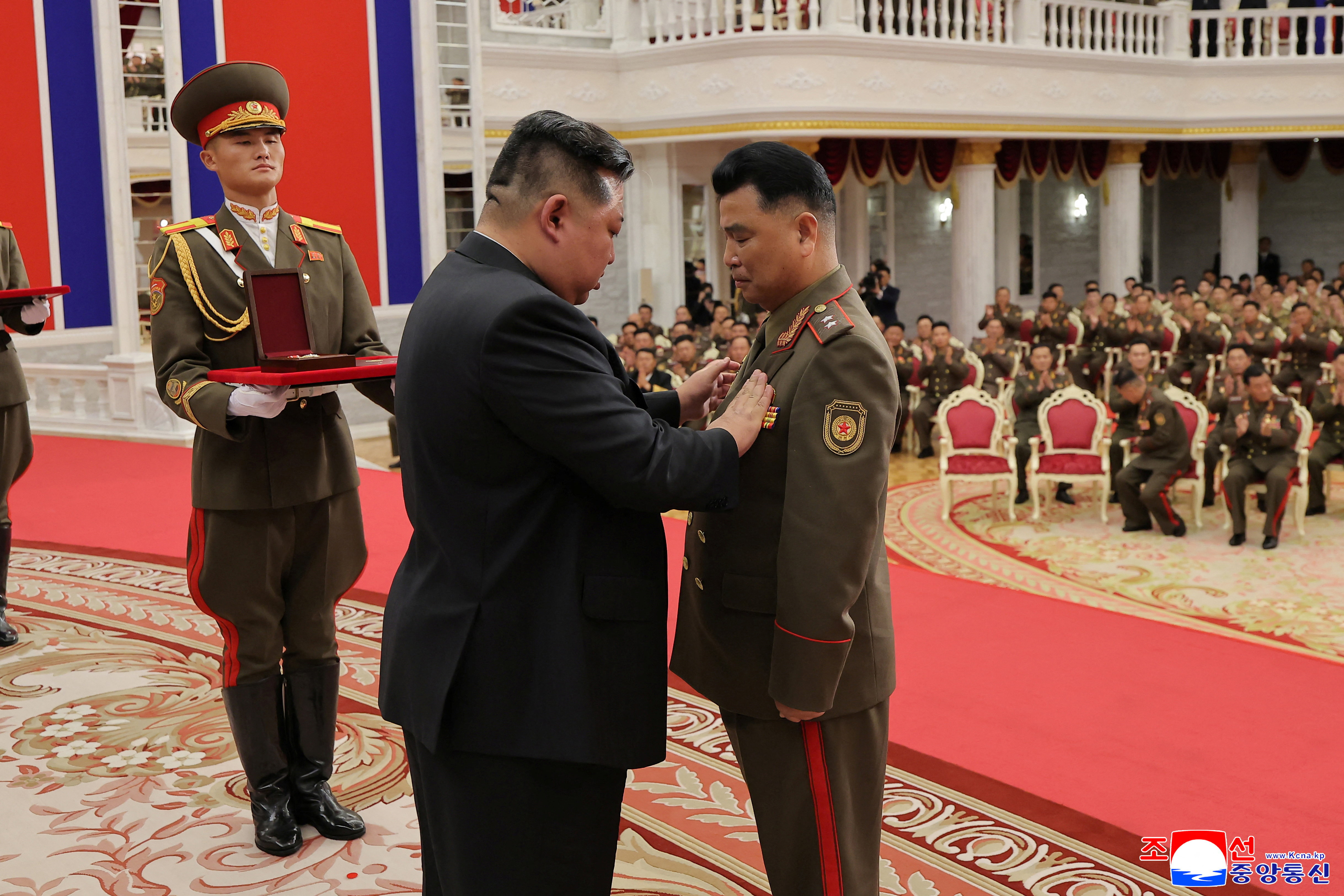 North Korean leader Kim Jong attends a national commendation ceremony at the headquarters of the Central Committee of the Korean Workers' Party,  in Pyongyang