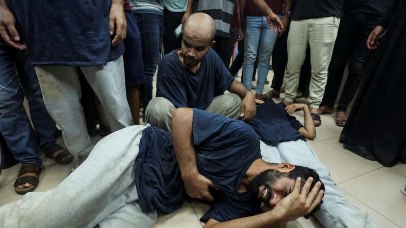 Palestinians who were detained by Israel arrive at Al-Aqsa Martyrs Hospital following their release, in Deir Al-Balah in the central Gaza Strip