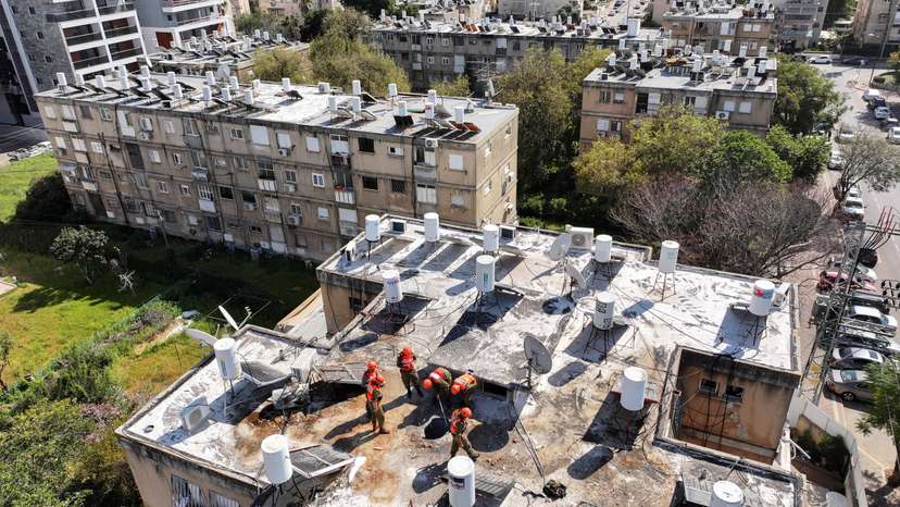 A drone view of site of an Iranian missile strike, amid the U.S.-Israel conflict with Iran, in Petah Tikva