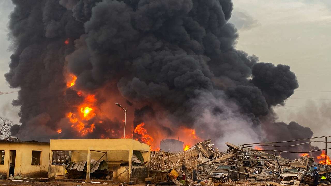 Fire burns after a blast at an oil terminal in Conakry