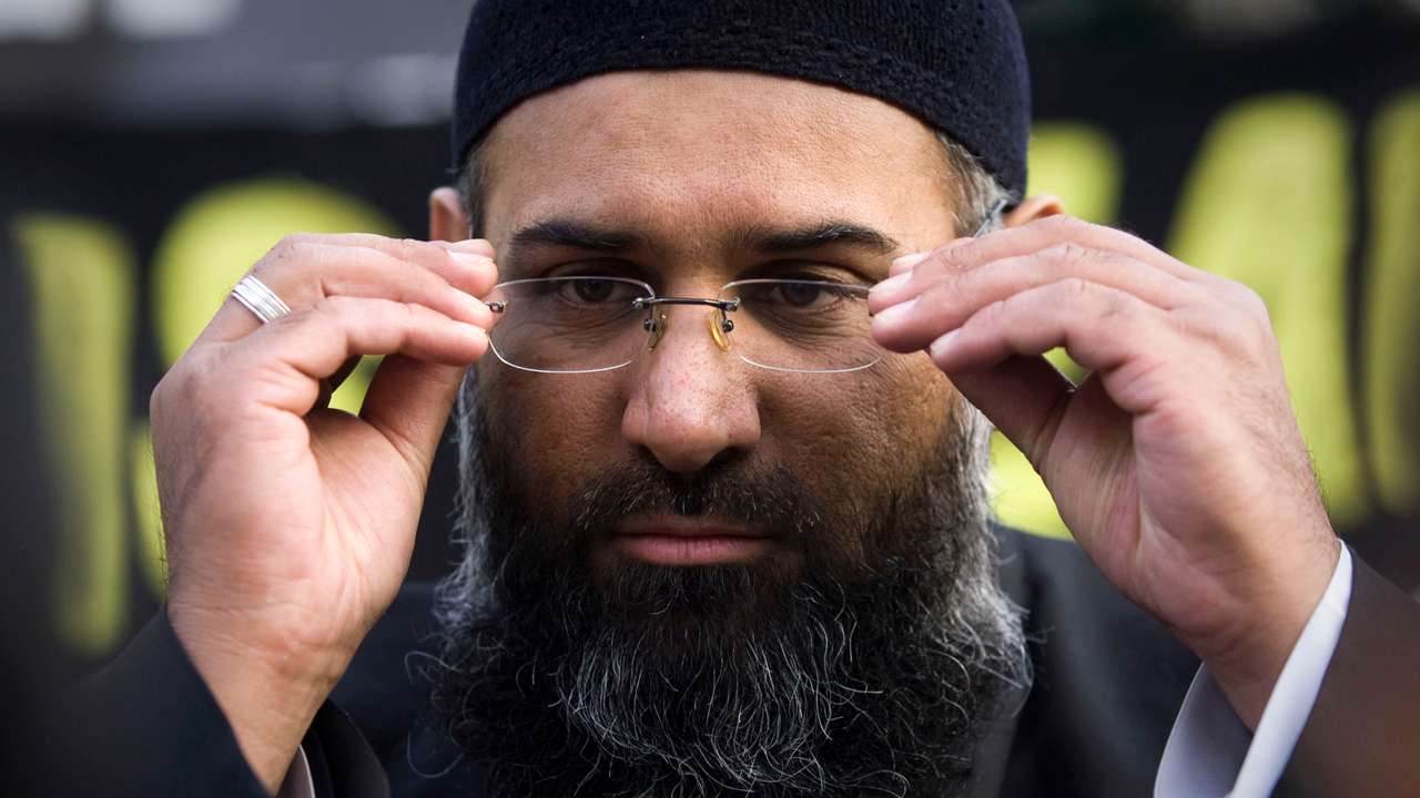 Islamic preacher Choudary addresses members of the media during a protest supporting the Shari'ah Law, in north London