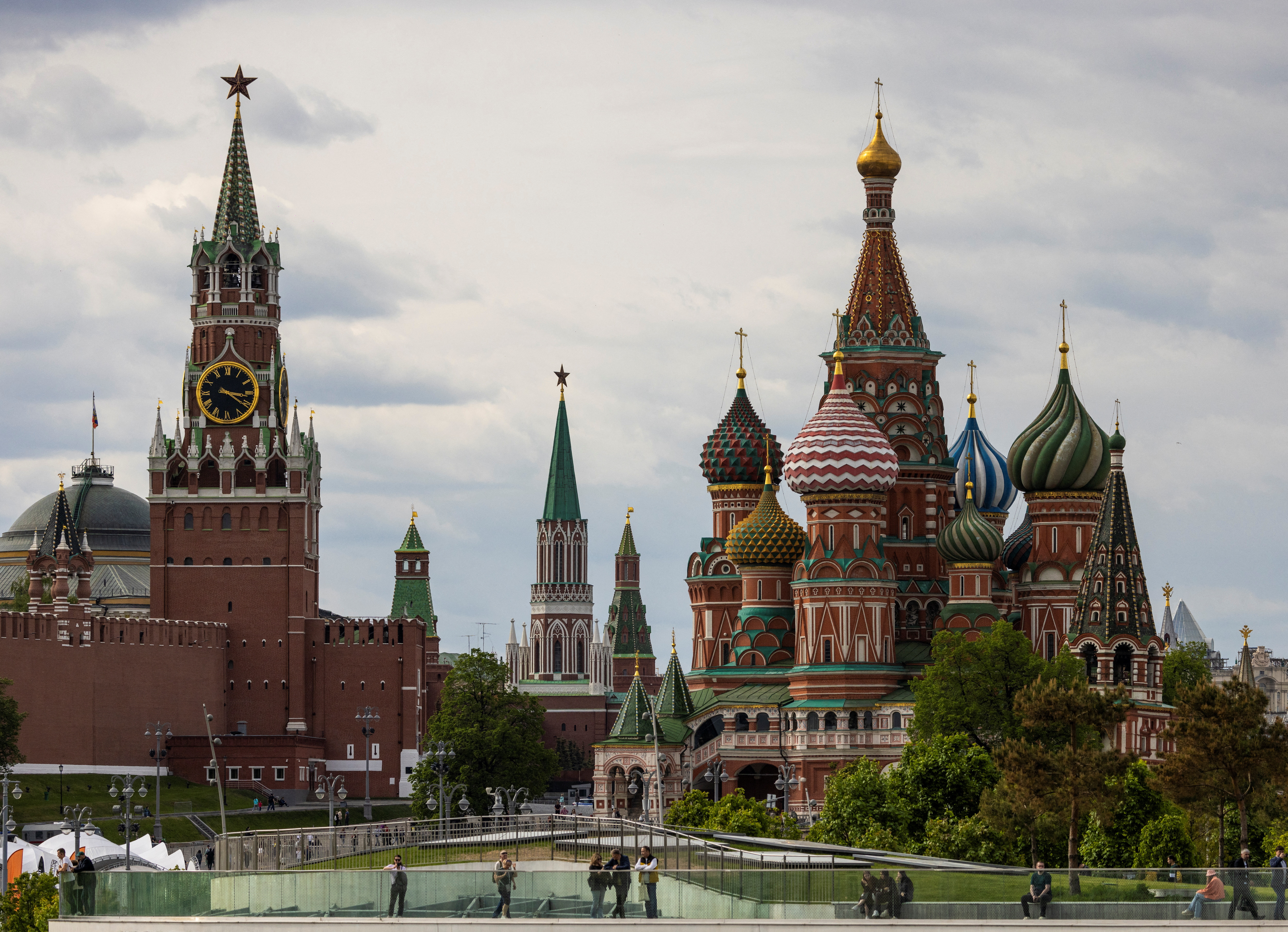 A general view on the Spasskaya tower of the Kremlin and St. Basil's Cathedral in Moscow