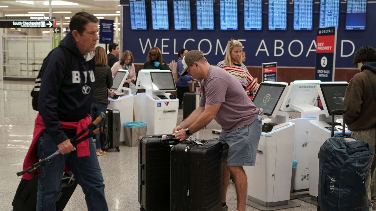 Air travellers face the morning commute at Hartsfield-Jackson Atlanta International Airport