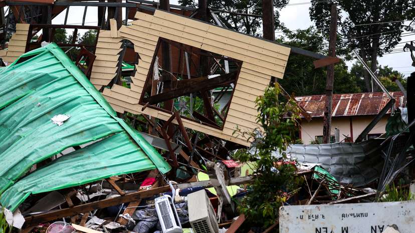 A house damaged by Cambodia's shelling is pictured in Sisaket province, ahead of a ceasefire talks in Malaysia on the deadly border conflict between Thailand and Cambodia