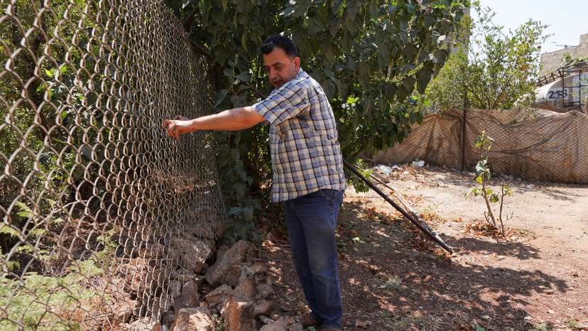 Abdelqader al-Sheikh attends an interview with Reuters in Atmeh