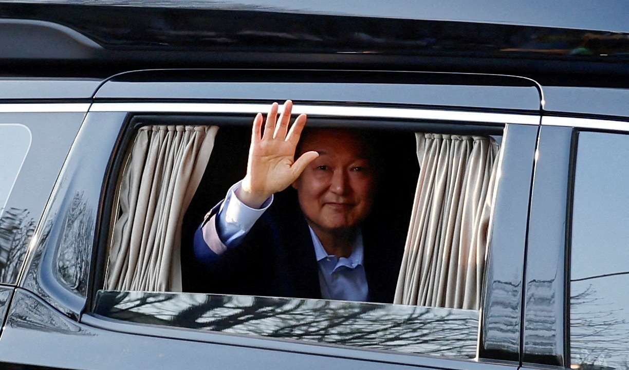 FILE PHOTO: South Korea's ousted president Yoon arrives at his private residence, in Seoul