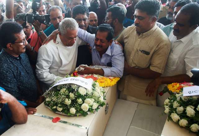 India brings home bodies of workers killed in Kuwait fire