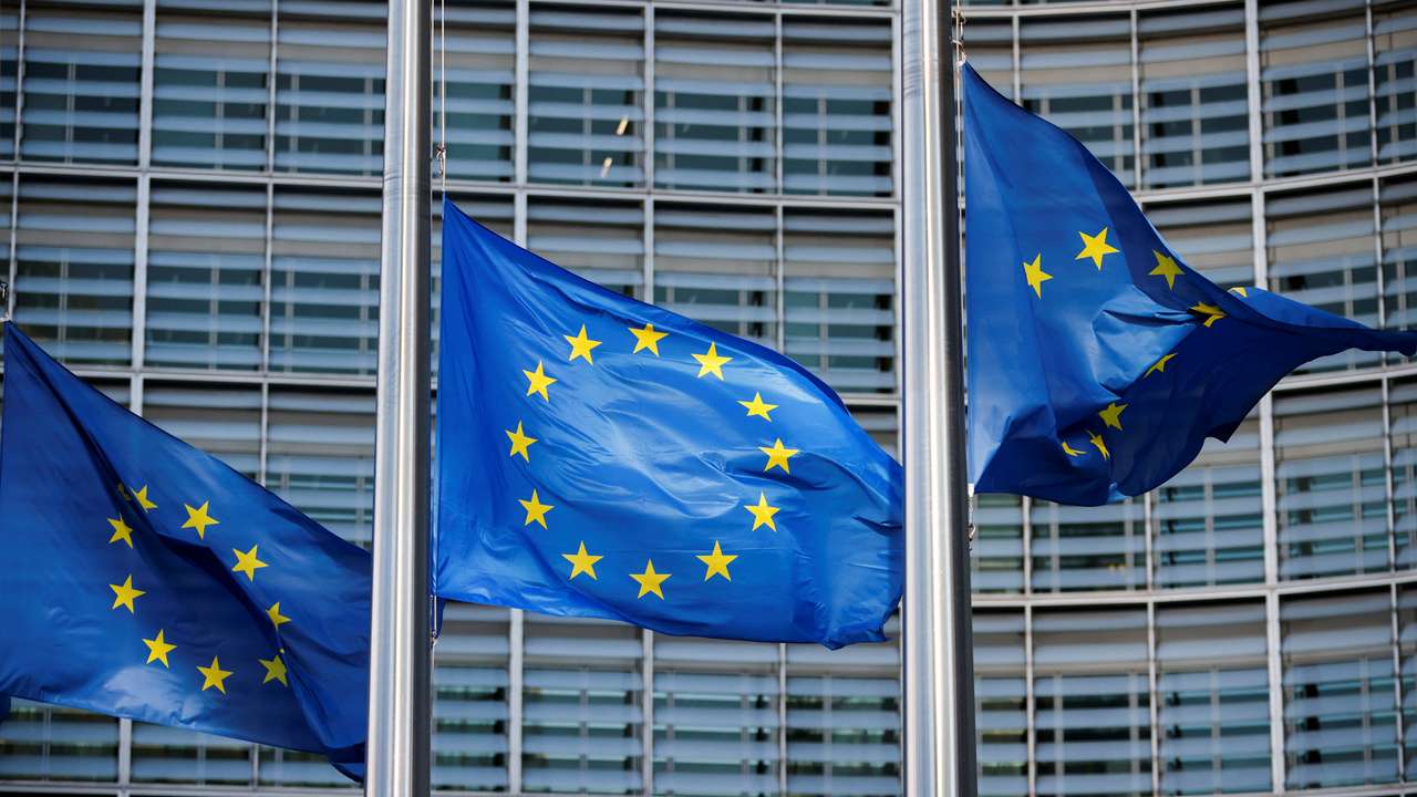 European Union flags fly outside the European Commission headquarters in Brussels