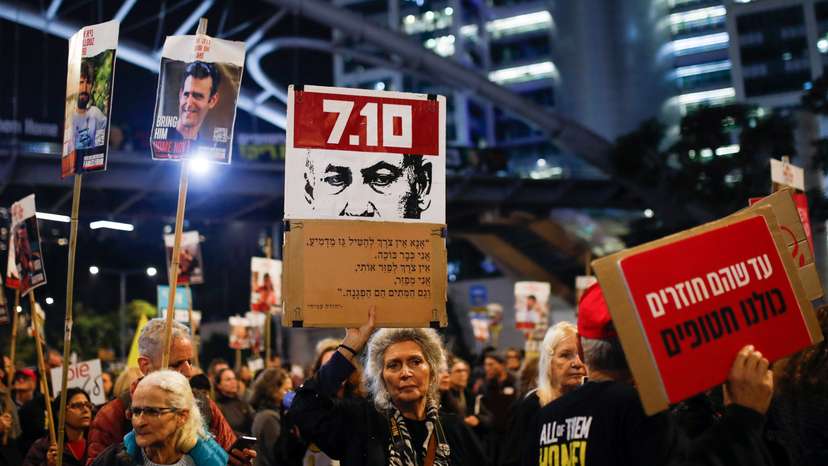 Supporters and family members of hostages protest ahead of a ceasefire between Israel and Hamas, in Tel Aviv