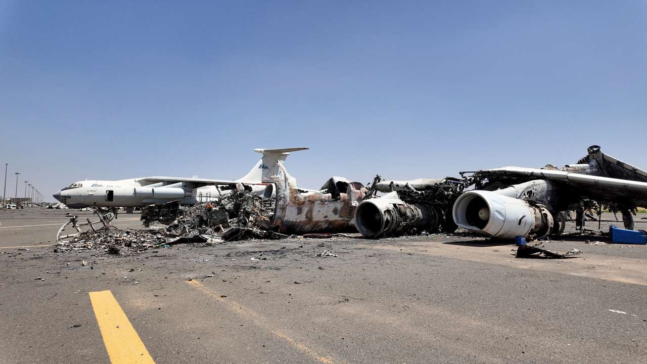 A general view of destroy planes' wreckages on tarmac at Khartoum Airport