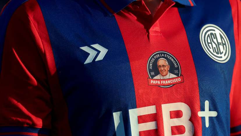 Fans of San Lorenzo de Almagro, Pope Francis' hometown soccer team, cheer for their team, in Buenos Aires