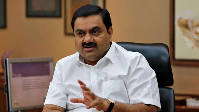 FILE PHOTO: Indian billionaire Adani speaks during an interview with Reuters at his office in Ahmedabad