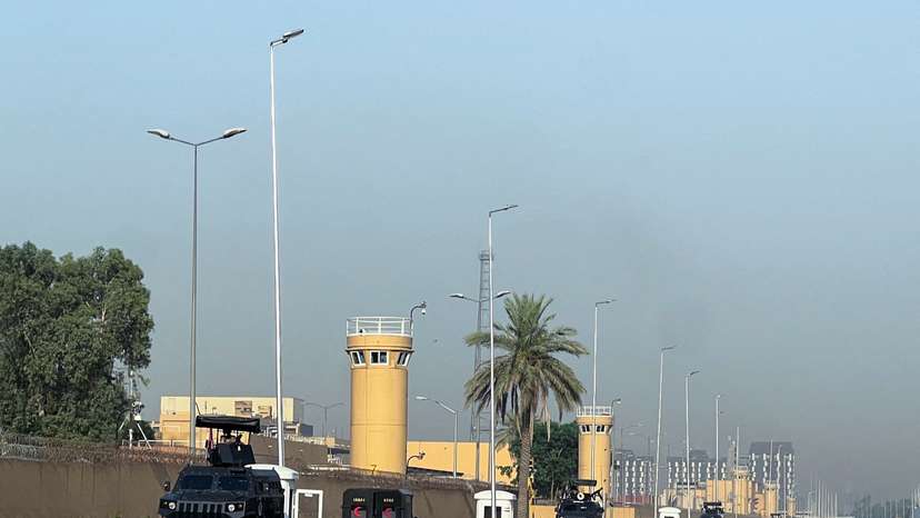 Armored vehicles belonging to Iraqi security forces are stationed outside the U.S. Embassy in Baghdad’s Green Zone,