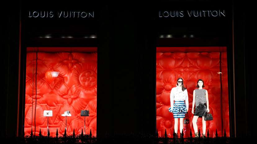 FILE PHOTO: Louis Vuitton logo is seen outside a store in Paris
