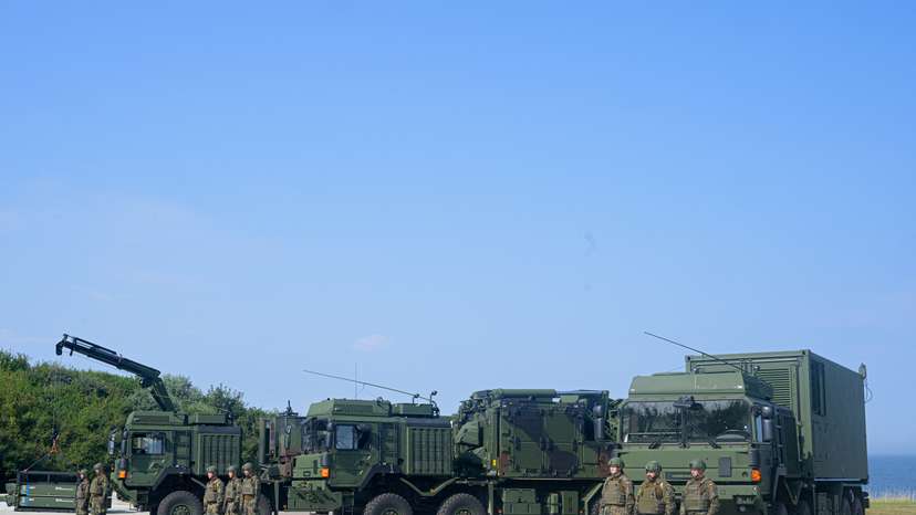 German Chancellor Scholz and Defence Minister Pistorius take part in the commissioning of the IRIS-T SLM air defence system in Panker