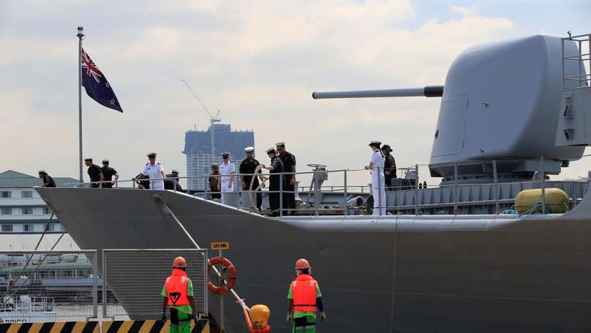 Crew members of the Royal New Zealand Navy frigate HMNZS Te Kaha (F77) prepare to dock upon arrival at the South Harbor, for a four-day goodwill visit in metro Manila