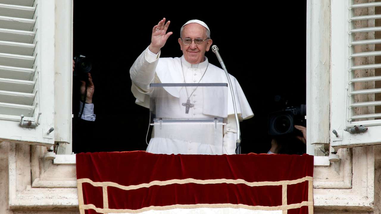 FILE PHOTO: Newly elected Pope Francis appears at the window of his future private apartment to bless faithful during Angelus prayer at Vatican