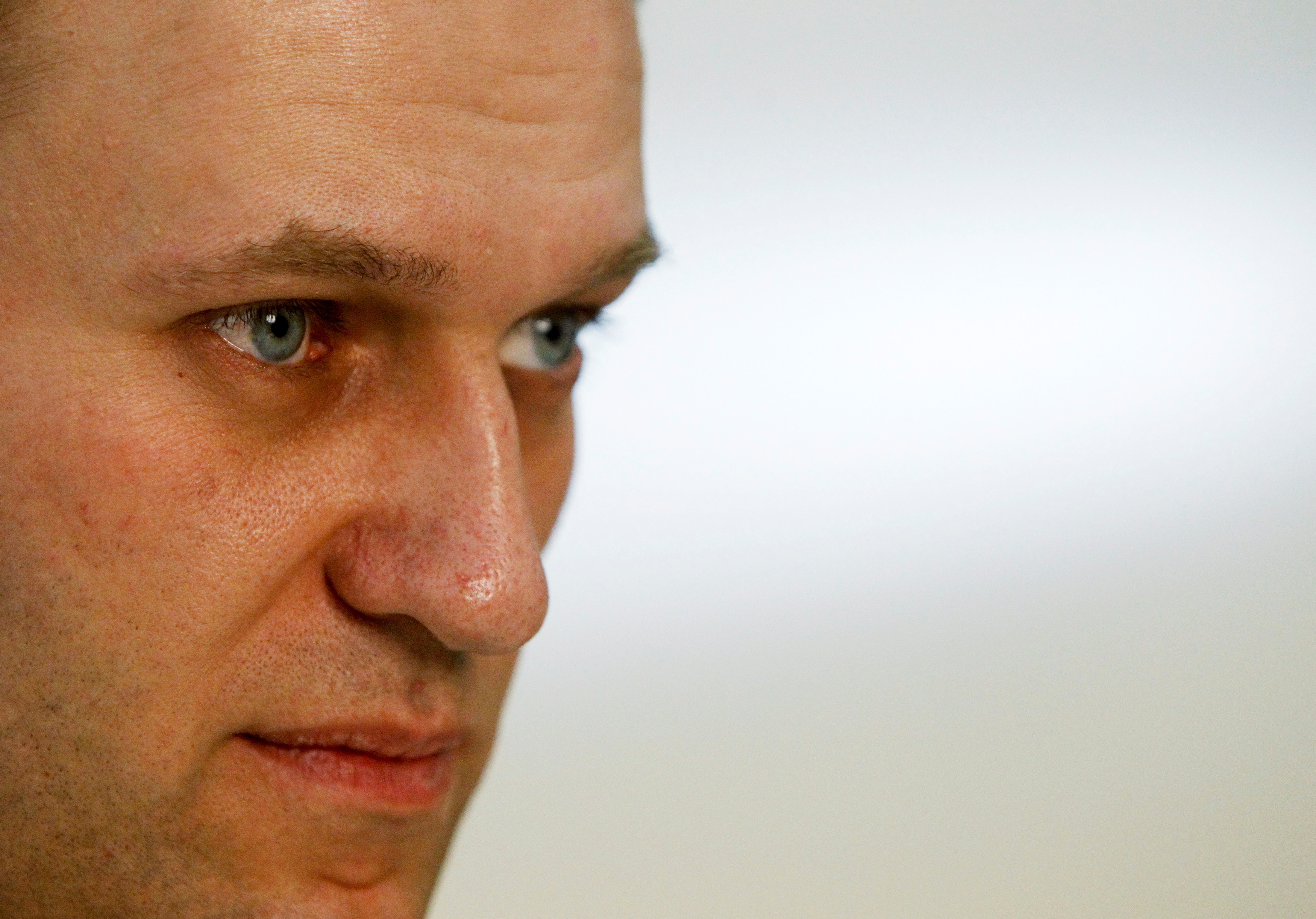 FILE PHOTO: Russian opposition leader and anti-graft blogger Alexei Navalny gives an interview to Reuters at his office in Moscow