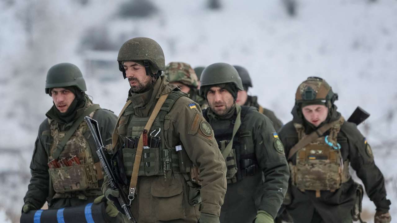 FILE PHOTO: Ukrainian servicemen attend mock anti-sabotage drills near the border with Russia in Sumy region