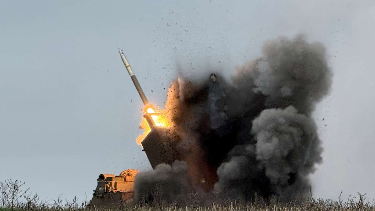 Ukrainian servicemen fire a Multiple Launch Rocket System towards Russian troops near the frontline town of Pokrovsk