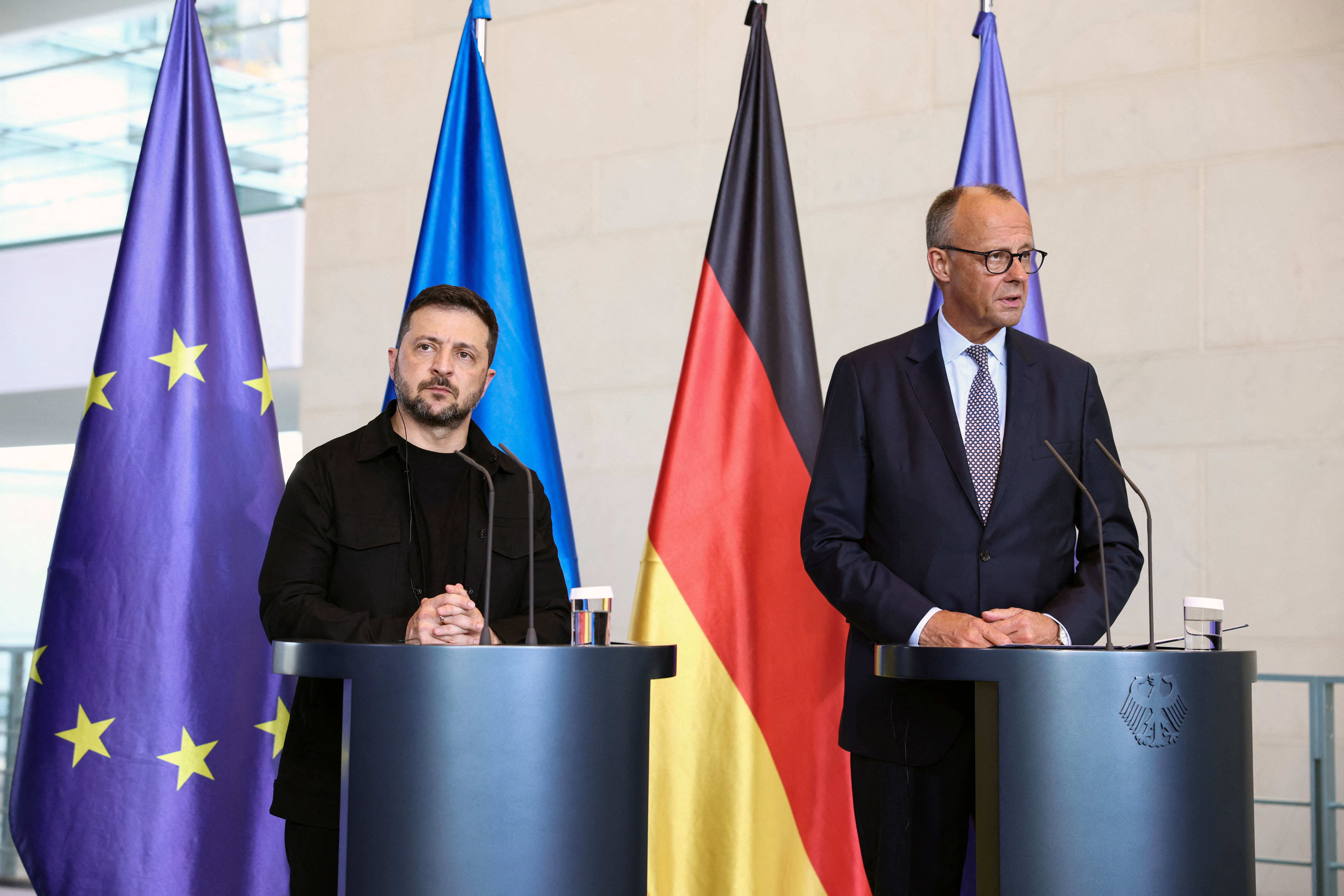 German Chancellor Merz speaks to the media, in Berlin