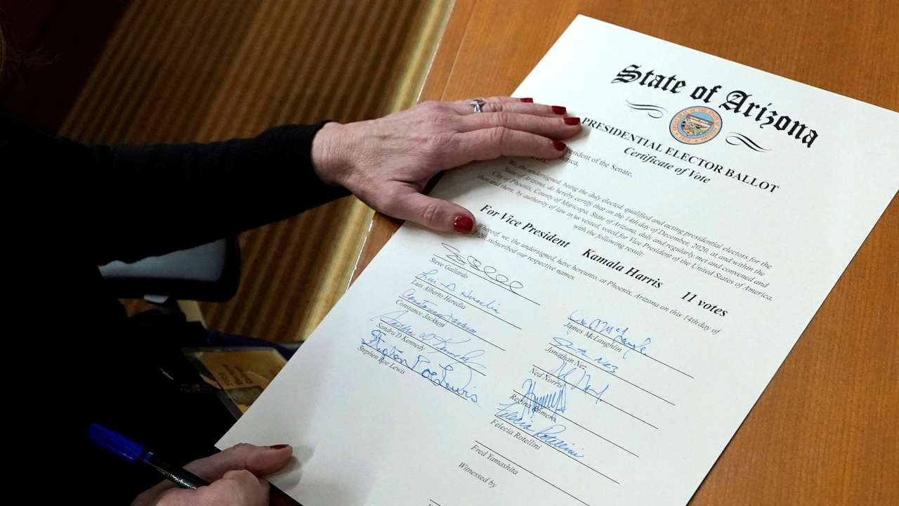 FILE PHOTO: Arizona's electors gather to cast their votes for the U.S. presidential election in Phoenix