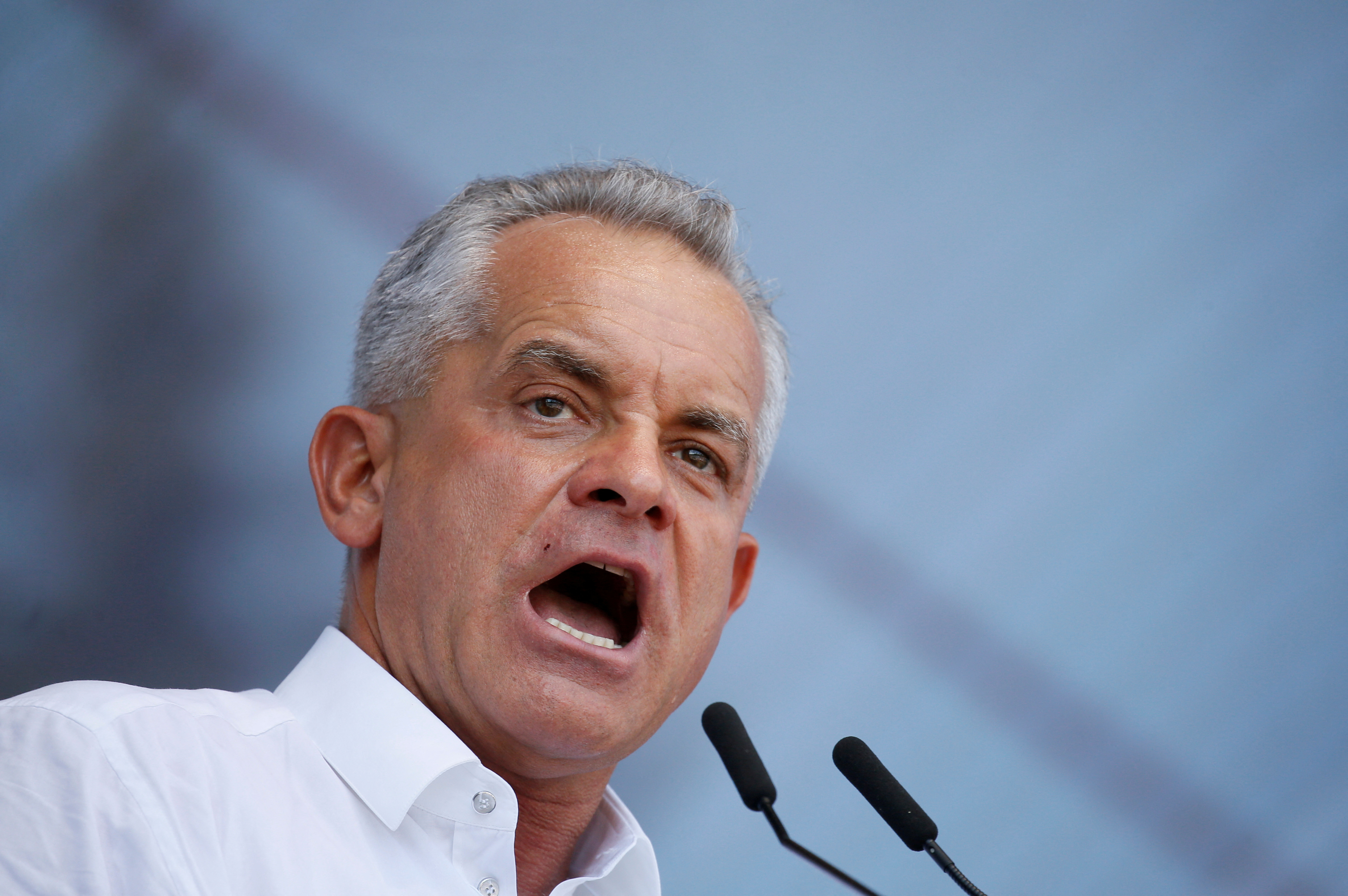 FILE PHOTO: Leader of the Democratic Party of Moldova Vladimir Plahotniuc delivers a speech during a rally in Chisinau
