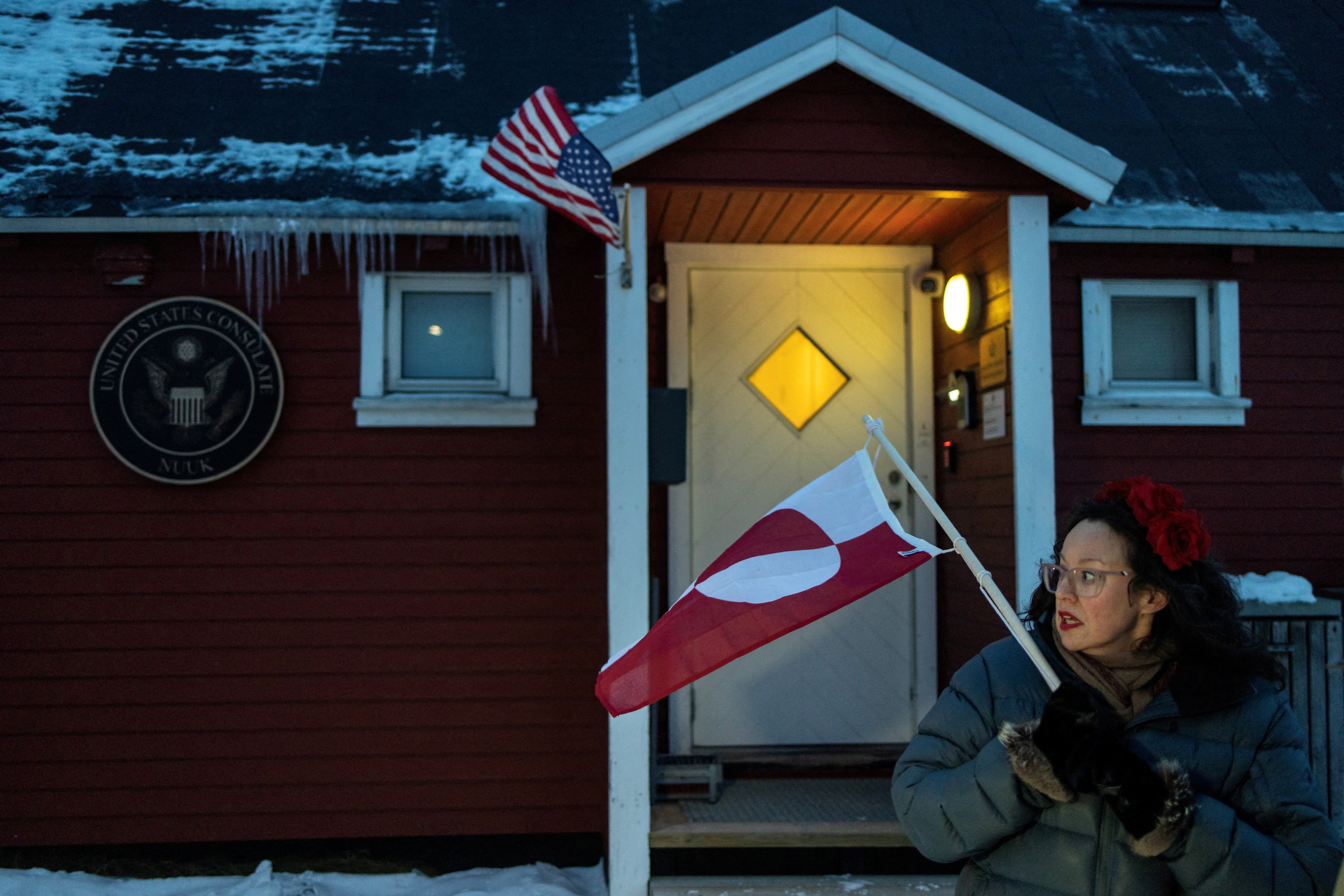 People protest in front of the U.S. consulate in Nuuk