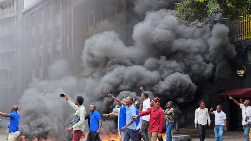 Supporters of the Movement for the Liberation of the Congo (MLC) party contest the results of the legislative elections in Kinshasa