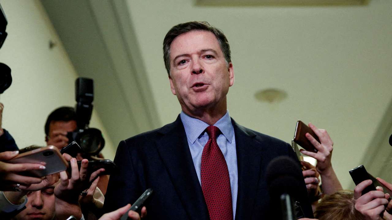 Former FBI Director James Comey speaks to the media after giving a private deposition to the House Judiciary and House Government and Oversight committees on Capitol Hill in Washington
