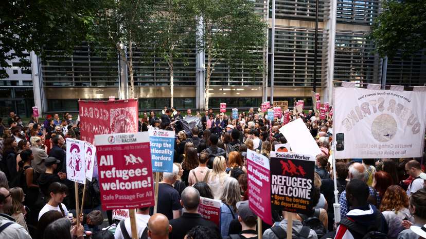 Protestors demonstrate outside the Home Office building against the British Governments plans to deport asylum seekers to Rwanda