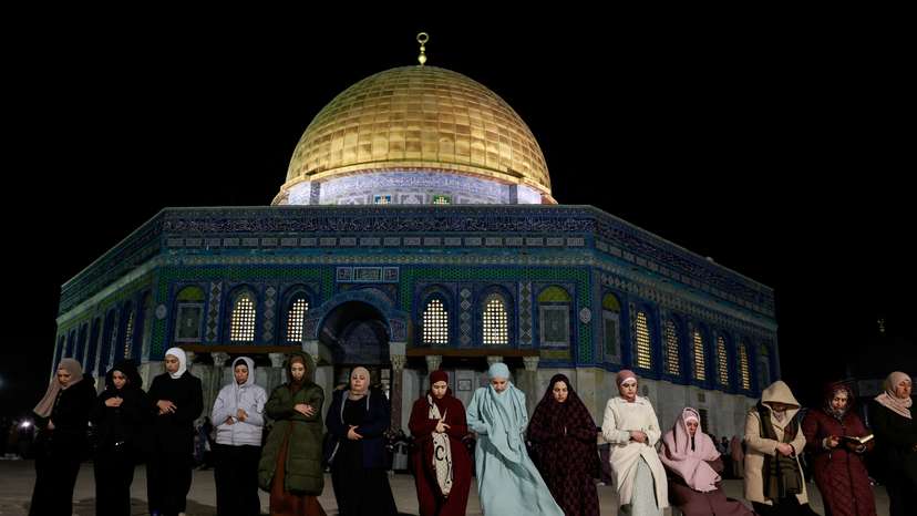 Muslim worshippers take part in the evening 'Tarawih' prayers during the holy month of Ramadan, in Jerusalem’s Old City