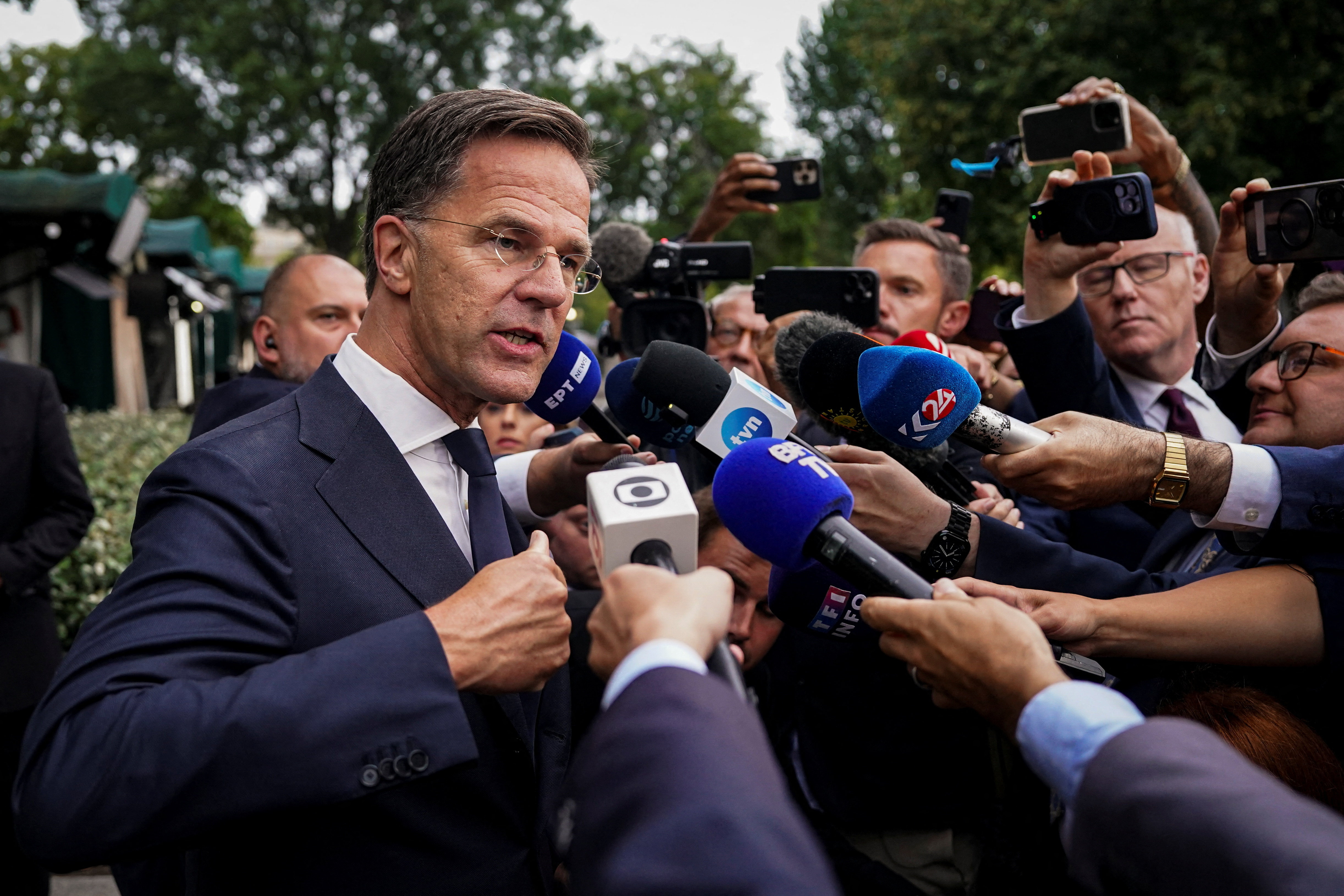 NATO Secretary General Mark Rutte speaks with journalists following a television interview at the White House, in Washington, D.C.