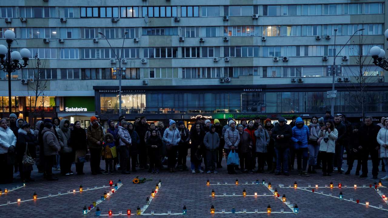 People commemorate victims of Russian air strike on Mariupol's Drama Theatre, in Kyiv