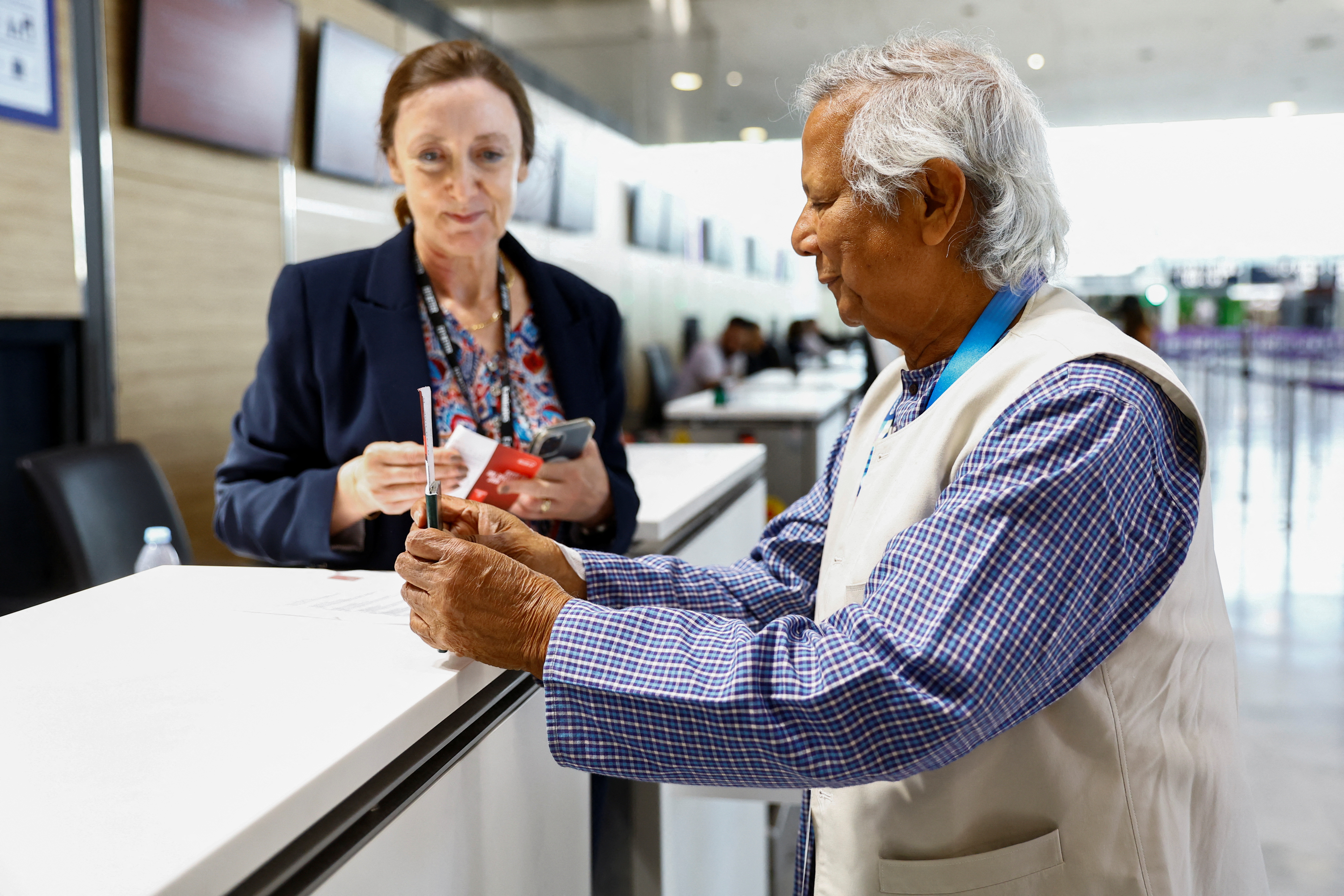 Nobel laureate Muhammad Yunus arrives at Paris Charles de Gaulle airport in Roissy-en-France